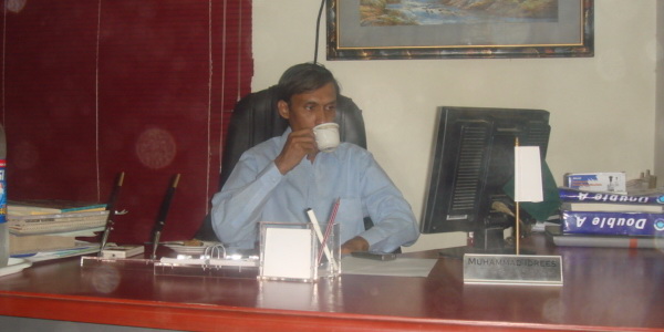 Muhammad Idrees -Principal in his office